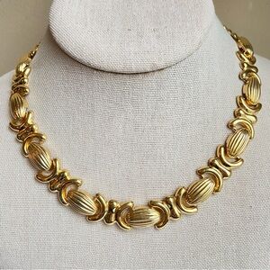 Avon NR segment collar necklace XO style shiny goldtone metal and foldover clasp